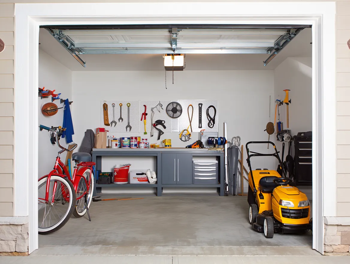 Garage after Nuvellira organization Organized garage with wall storage and clear zones